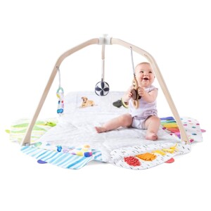 the play gym by lovevery | stage-based developmental activity gym and play mat for baby to toddler